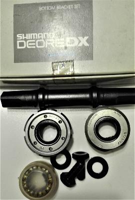 SHIMANO DEORE DX  BOTTOM BRACKET AXLE -  Axe de pedalier 123 mm